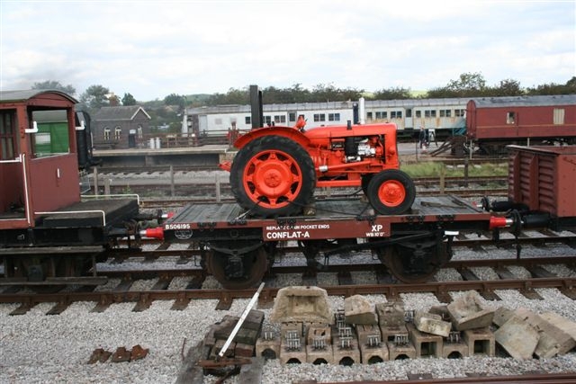 Conflat B506195 in Down Yard carrying a tractor