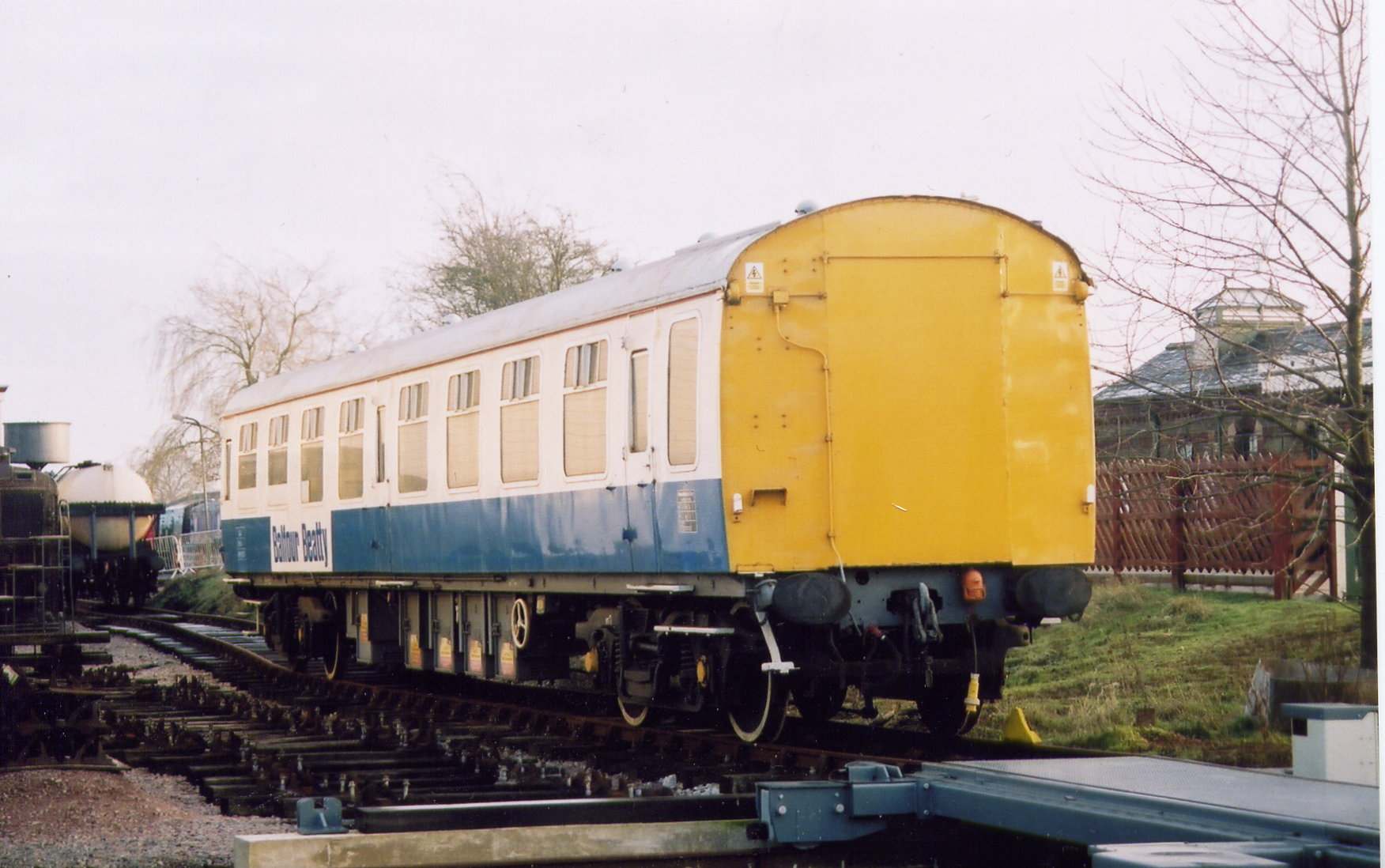 Balfour Beatty Mess Coach alongside Traverser