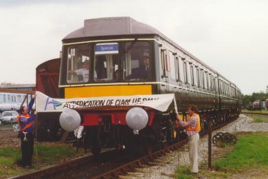 The DMU breaking the banner in July 1998 just before its rededication