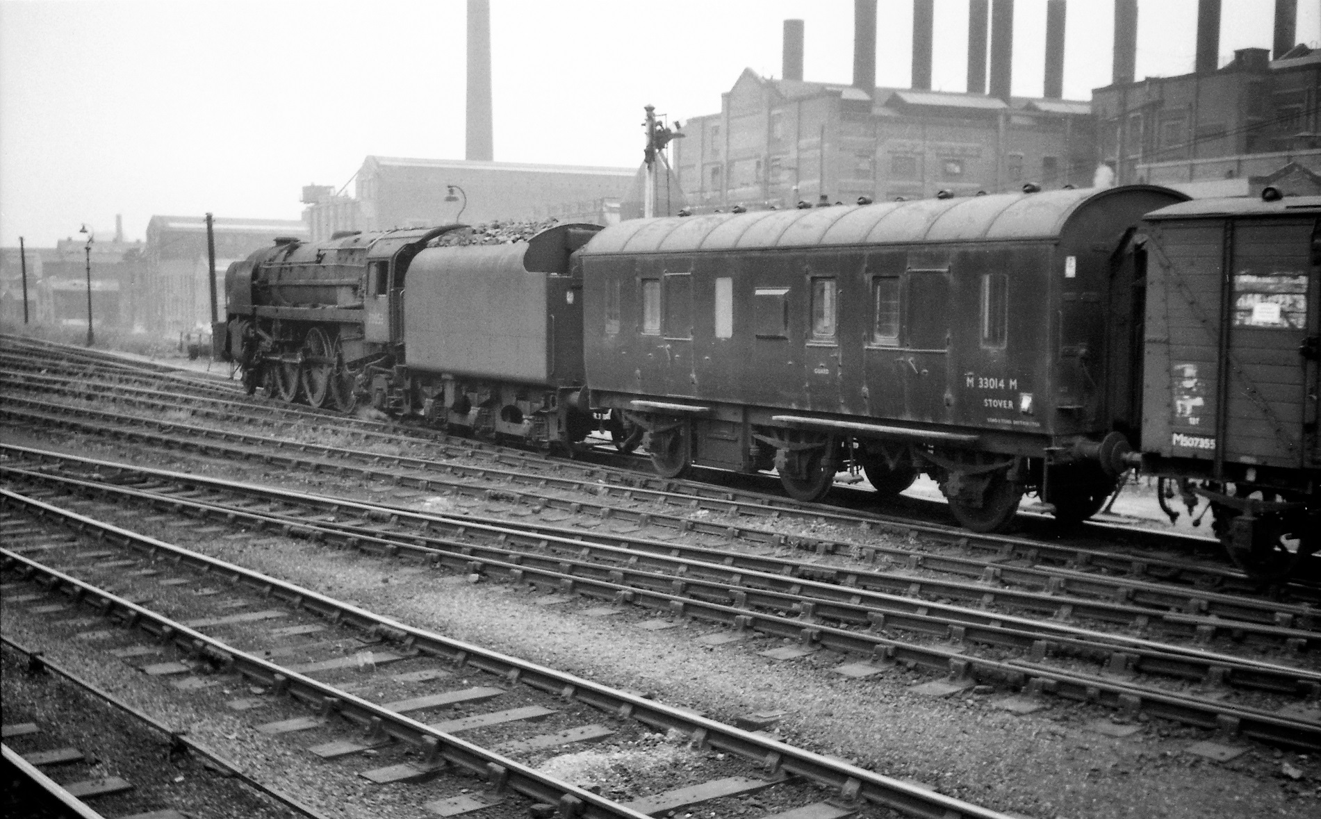 Britannia 70053 with 33014 behind at Leeds Wellington station in June 1966