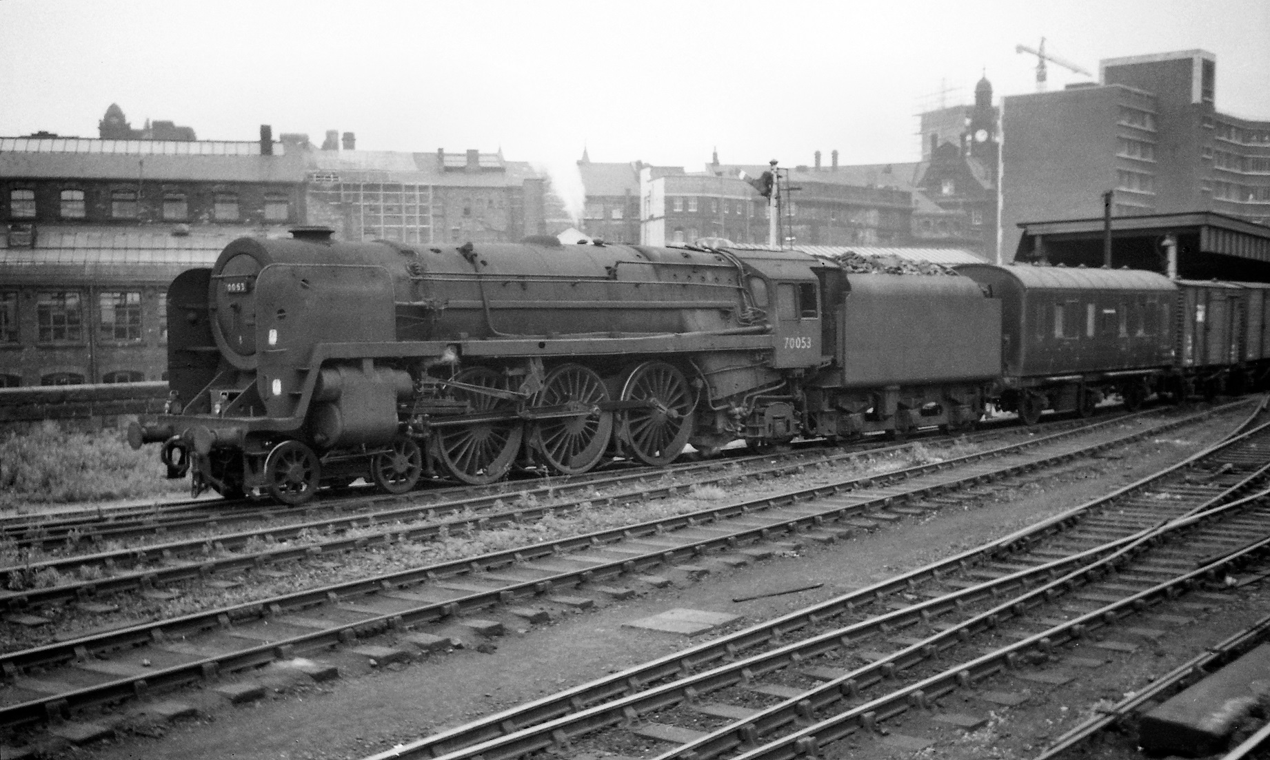 Britannia 70053 with 33014 behind at Leeds Wellington station in June 1966