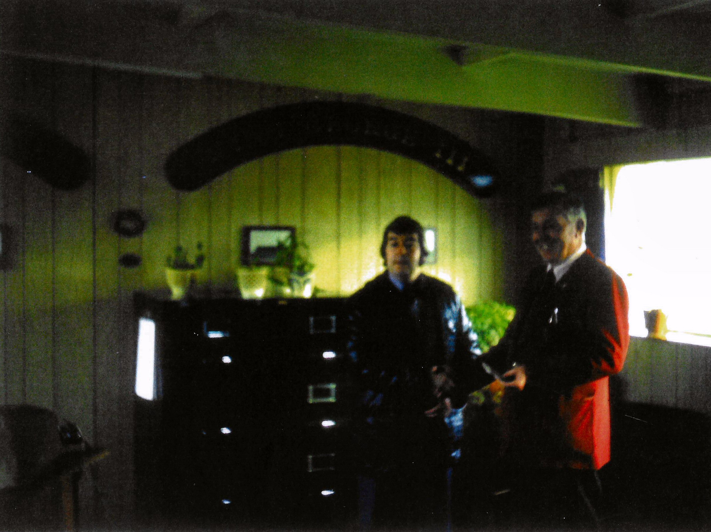 Founder Member Rod Thomas handing over cheque to Dai Woodham for the purchase of 6989 on 8th January 1977
