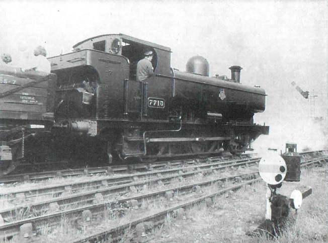 Ex-Great Western Railway 0-6-0 pannier tank No. 7715 ready to leave the platform