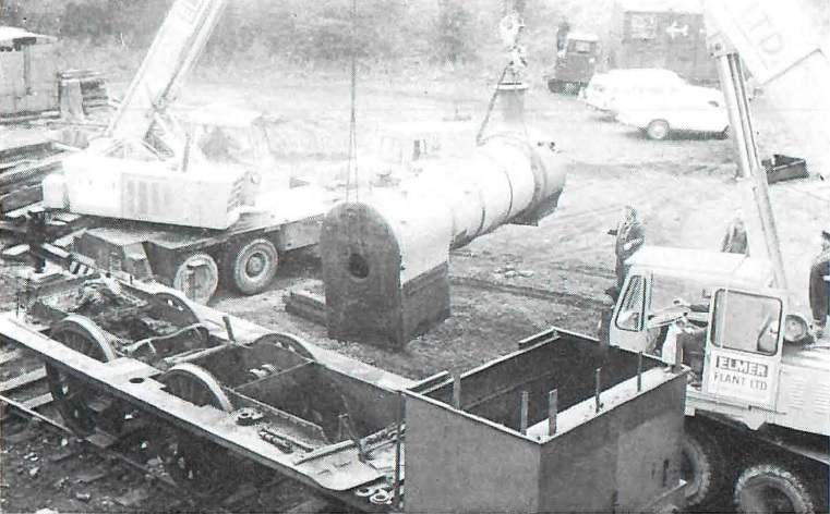 The photograph shows the lifting of L44's boiler which was completed using two cranes