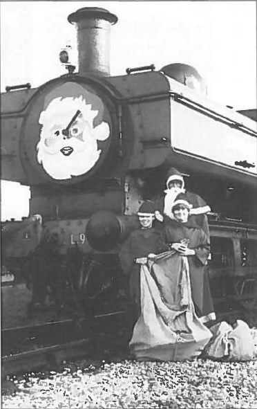 The Santa Specials were again busy last year. Santa and his pixies pose in front of the special train