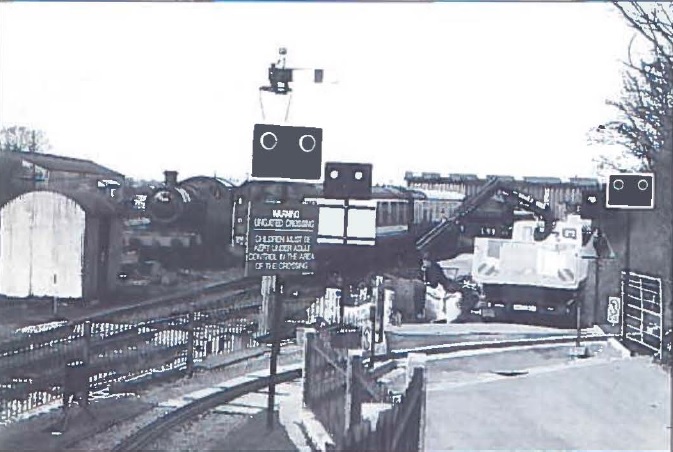 The new VAMES automatic level crossing under construction with a crowded Up-Yard behind it