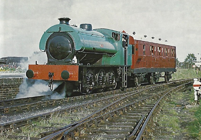QP7 - 0-6-0 saddle tank locomotive Juno and ex-Great Northern Railway Brake / 3rd coach No 1472 at Quainton Road Station. Juno
was built by the Hunslett Engine Co in 1958 to a design well known as the J94 class of the LNER and BR, and is now owned by the Ivatt
Locomotive Trust - photo by P I Clarke QP7 - Hunslett 0-6-0ST <I>Juno</i>