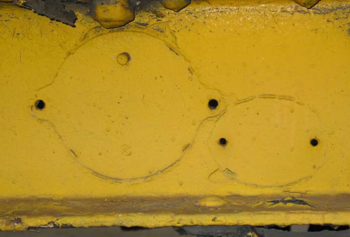 Imprints of the registration and repair plates on the solebar